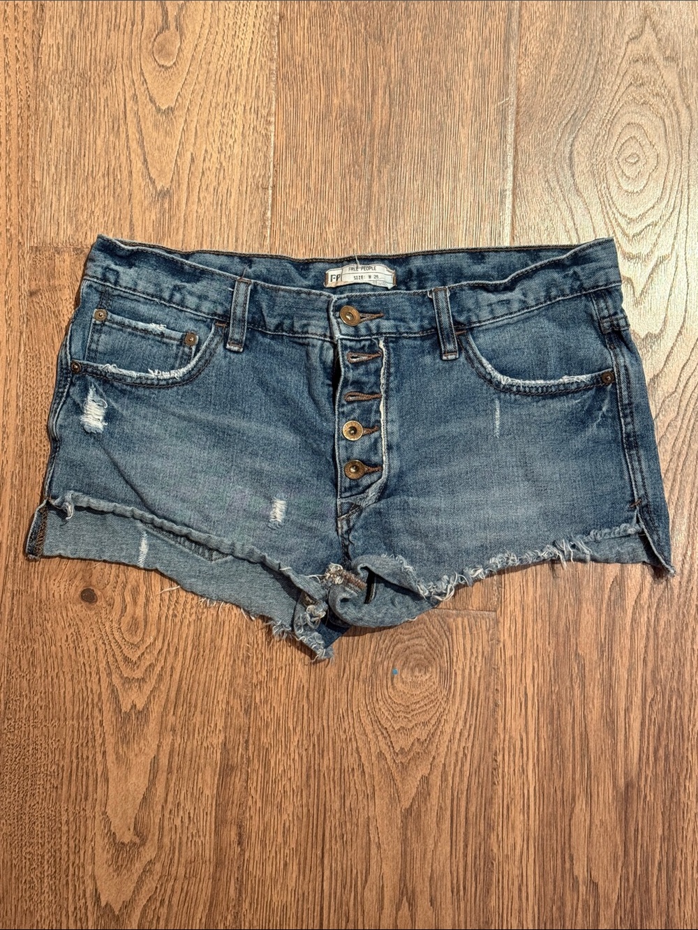 Free People Blue Distressed Button-Front Denim Shorts